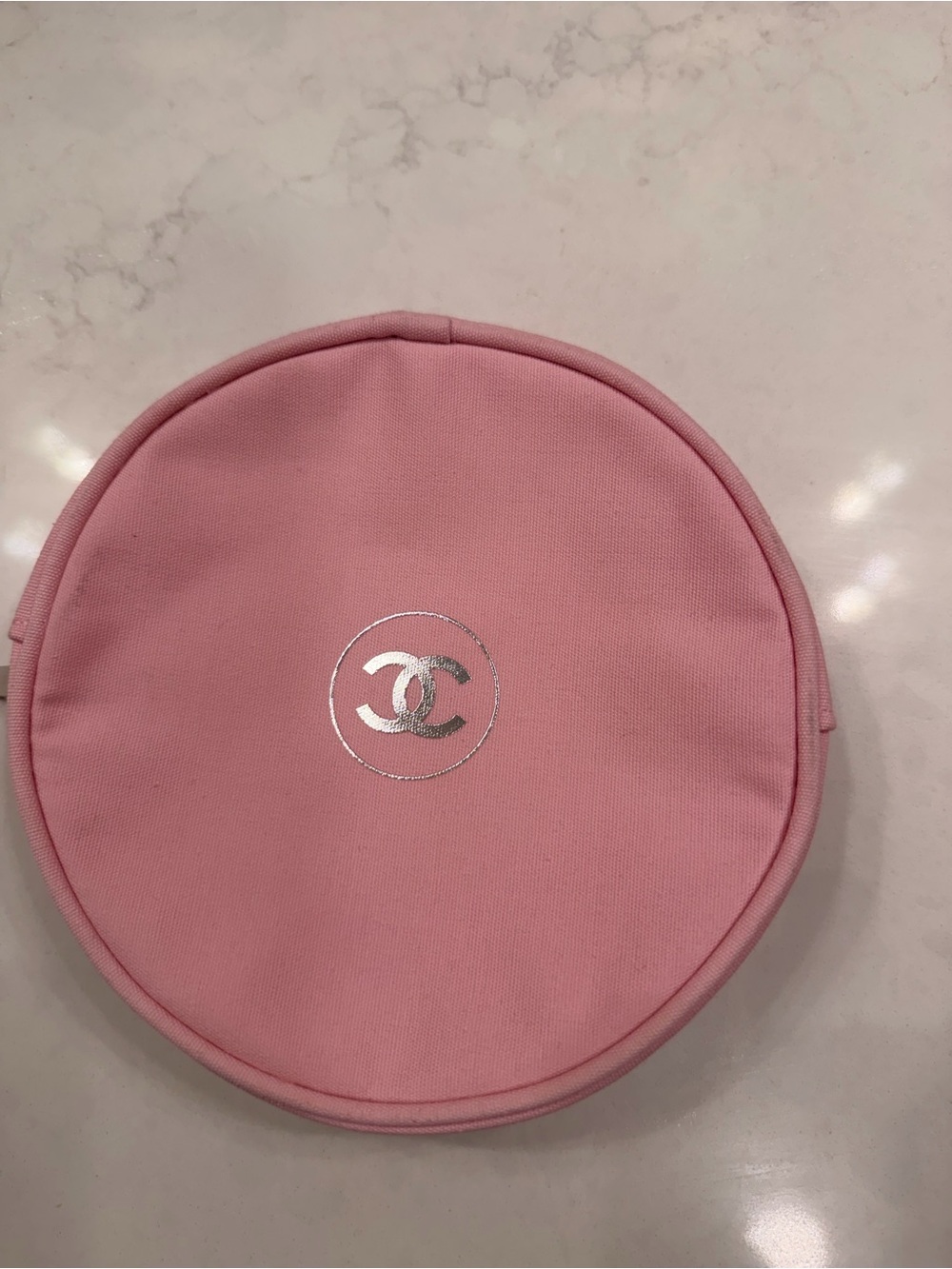 CHANEL Pink Round Cosmetic Case with Silver CC Emblem